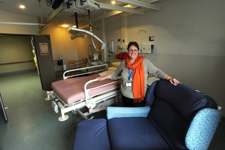 Judy Gosper, Director of Nursing, Operation Support, in a room for obese patients, which includes wide opening doors, wider chairs, a reinforced bed and a ceiling-mounted lifting unit. Photo: Graham Tidy