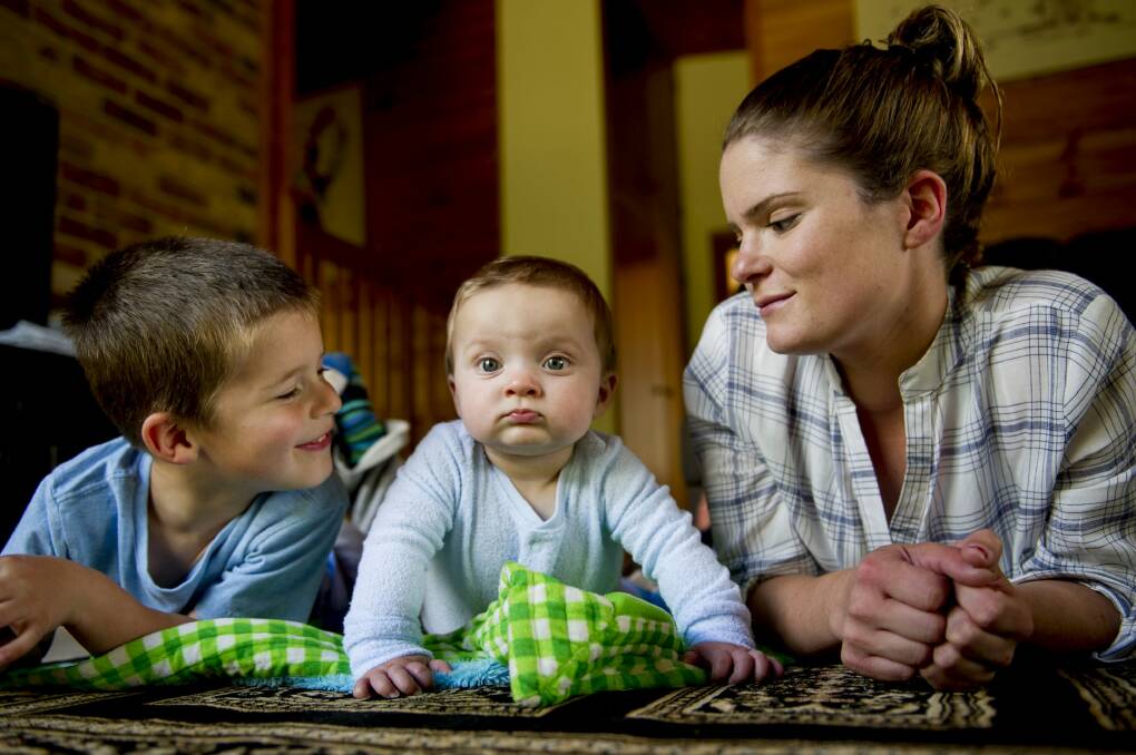 Bywong mother Lizzie Cann with sons Harley, 8 months, and Dusti, 4. Photo: Jay cronan