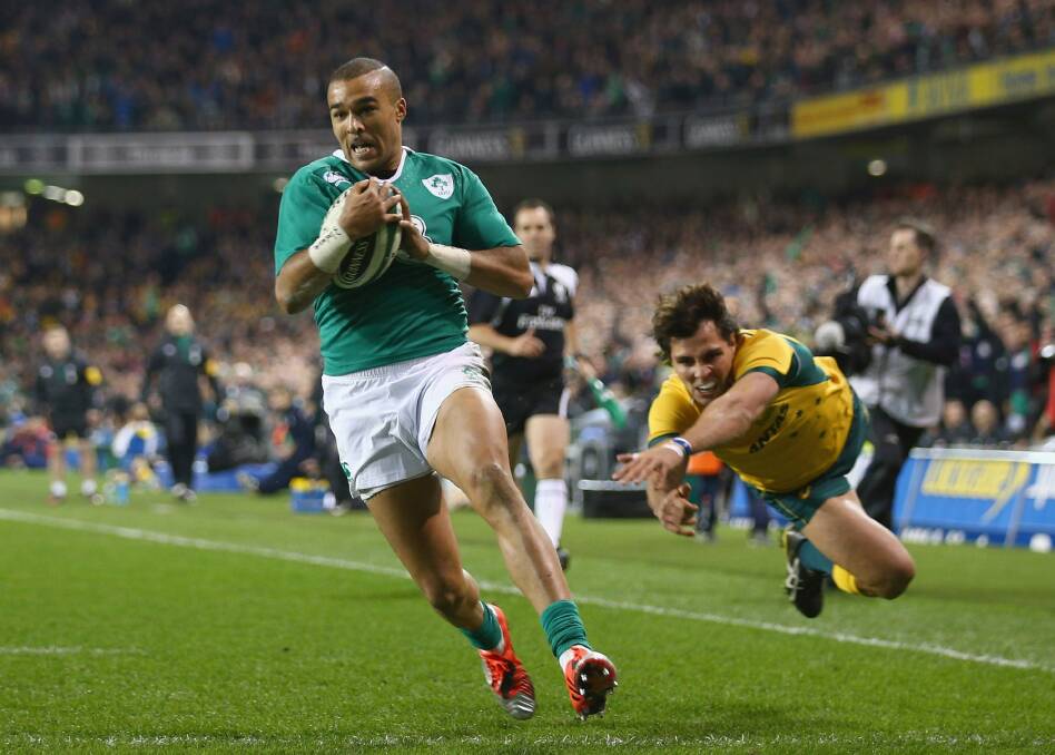 Flying start: Ireland winger Simon Zebo swoops on a kick to score the opening try. Photo: Getty Images