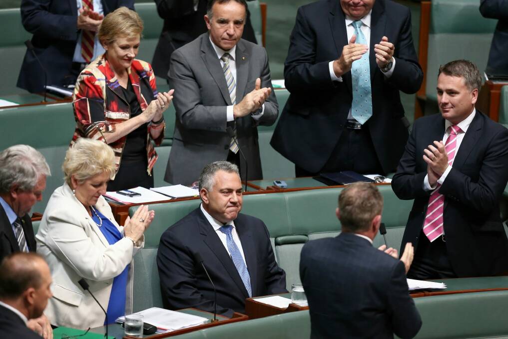Mr Hockey is applauded by colleagues after his speech. Photo: Alex Ellinghausen