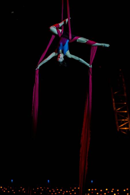 Julie Cameron performs on the aerial silks ahead of the opening night of Quidam in Canberra. Photo: Jamila Toderas