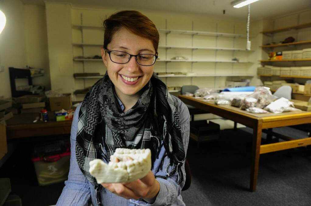 Elen Feuerriegel holds a 3D model of the lower jaw of Dinaledi Hominin 1. Photo: Melissa Adams