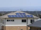 More solar panels for low-income families could save them thousands of dollars a year. (Dan Himbrechts/AAP PHOTOS)