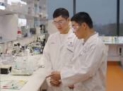 Dr Zhuyuan Wang and Professor Xiang Zhang's nanogenerator consumes greenhouse gases. (HANDOUT/UNIVERSITY OF QUEENSLAND)