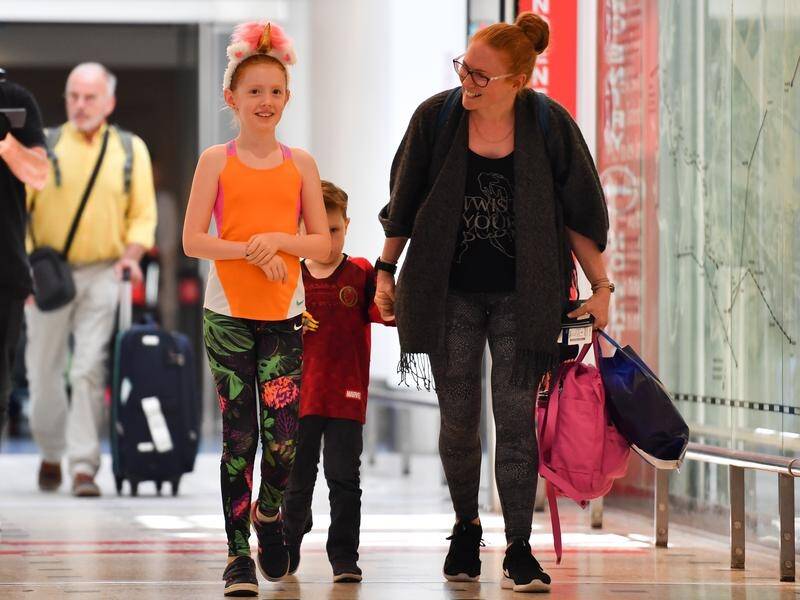 Katinka Hermens, 10, has been welcomed to Sydney Airport as its one billionth passenger.