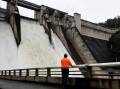 Warragamba dam - already at 99 per cent capacity - is expected to spill as NSW faces a wet weekend. (Dan Himbrechts/AAP PHOTOS)