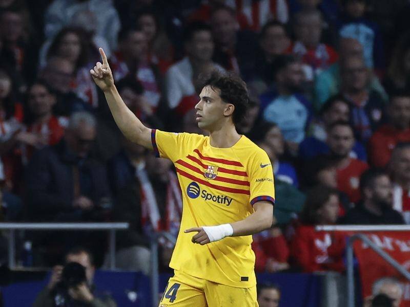 On-loan Joao Felix celebrates his goal in Barcelona's 3-0 win against his parent-club Atletico. (EPA PHOTO)