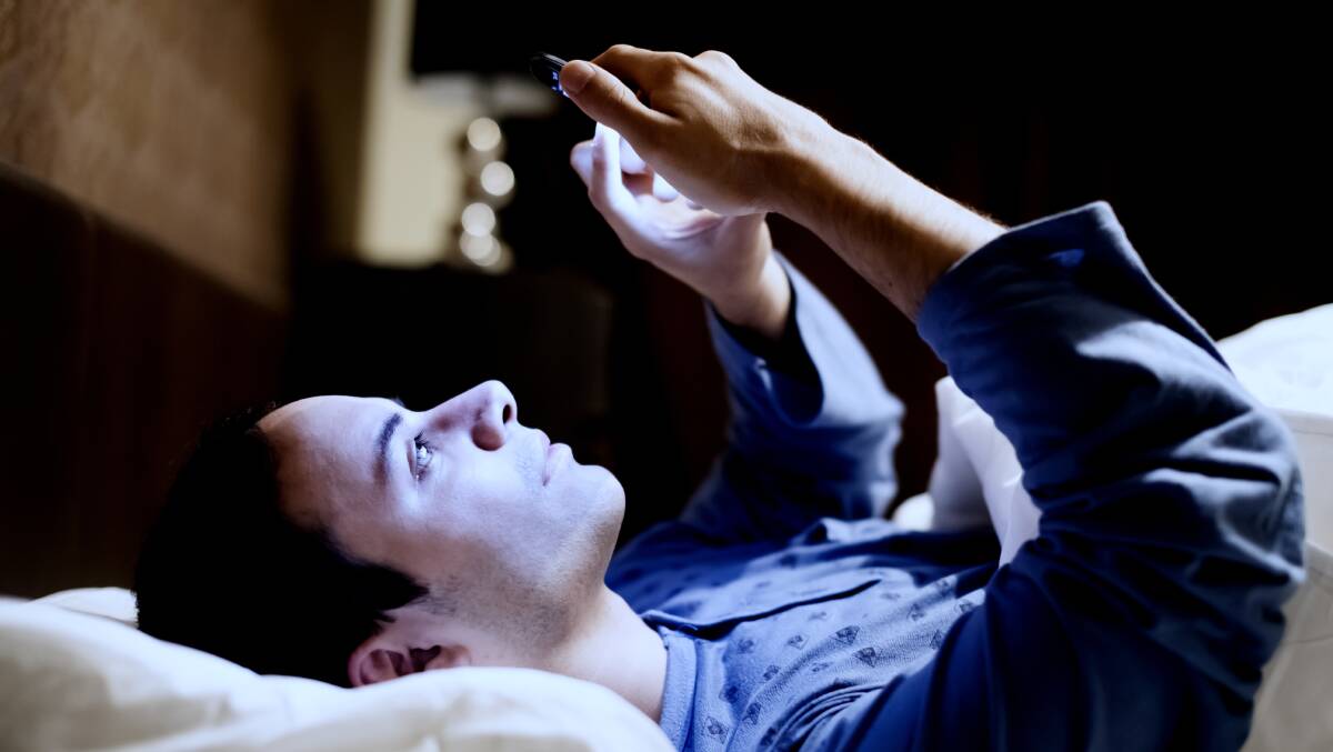 Many of us are reaching for our smartphones before we get out of bed. Picture: Shutterstock