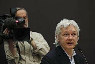 WikiLeaks founder Julian Assange talks during a news conference in central London.