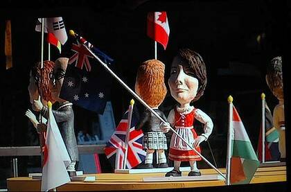 Right flag, wrong outfit . . . Julia Gillard is dressed in an Austrian costume in a window display in Seoul.