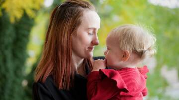 Queanbeyan's Melissa Mann, pictured with her 18-month-old daughter Charlotte, wants more support for new mums when it comes to breastfeeding. Picture by Sitthixay Ditthavong