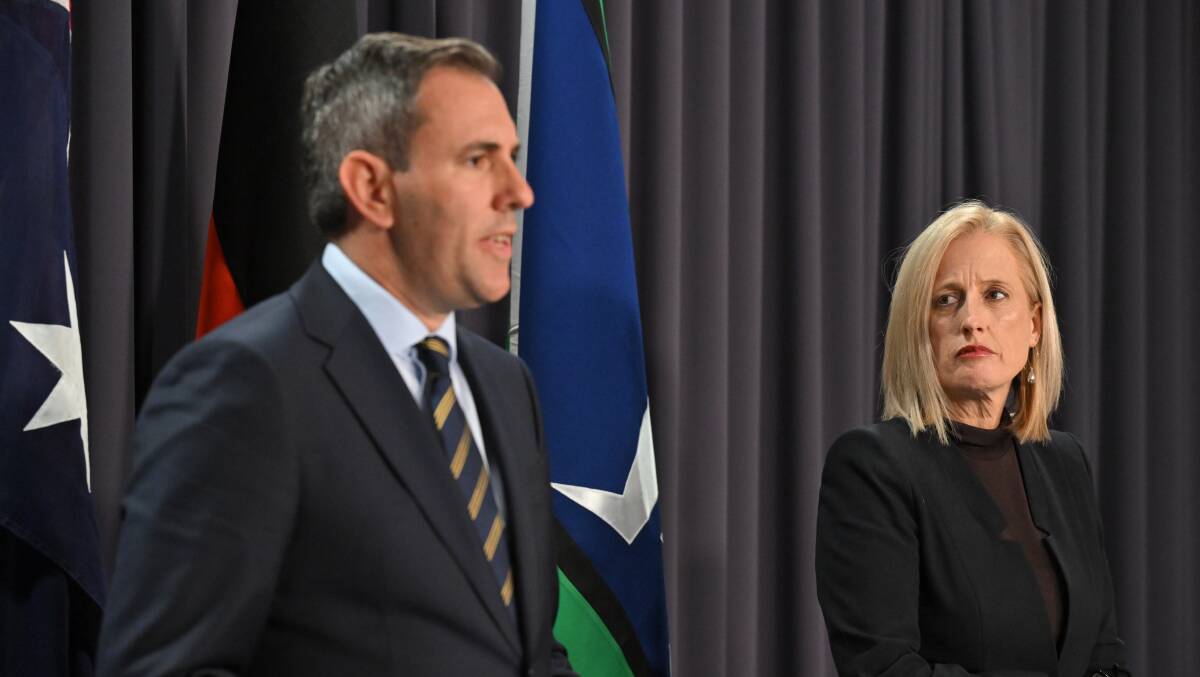 Treasurer Jim Chalmers and Finance Minister Katy Gallagher address the media in Parliament House on Monday.