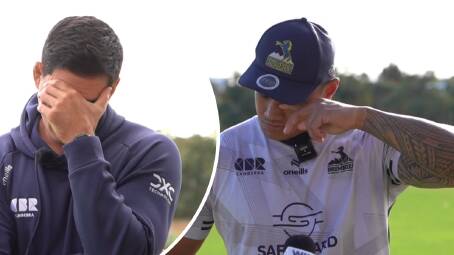 Darcy Swain, left and Len Ikitau were overcome by emotions on Monday.