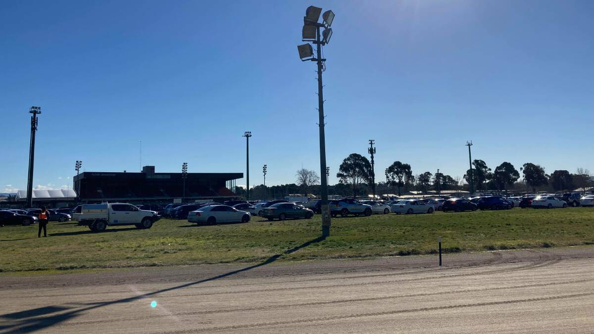 Cars line up at the Epic Exhibition Centre in Mitchell to get a Covid test on Thursday. Picture: Supplied