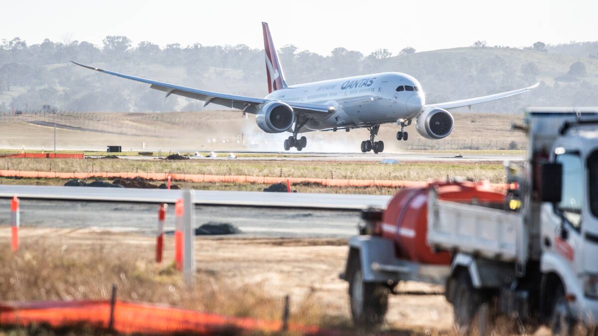 A Qantas plane arrives at Canberra Airport earlier this year. Picture: Karleen Minney
