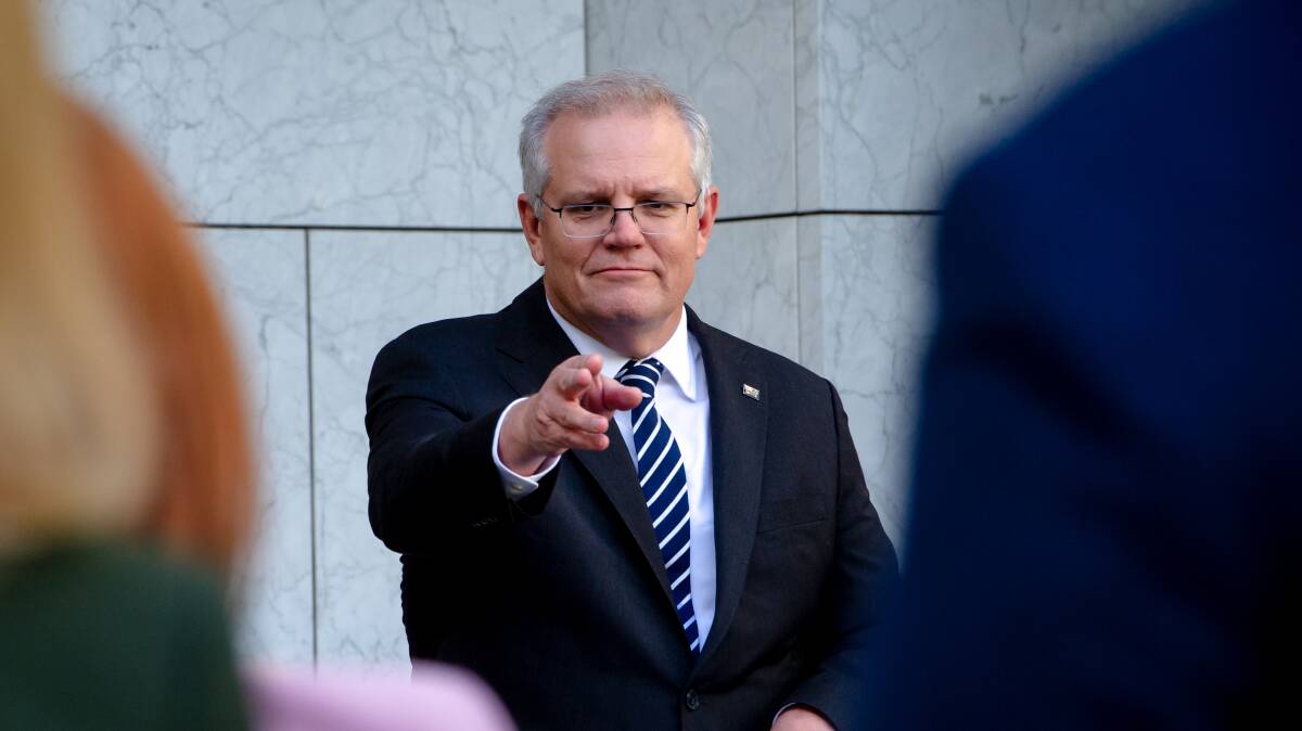 Prime Minister Scott Morrison has urged public servants to get back to the office in order to bring cities back to life. Picture: Elesa Kurtz