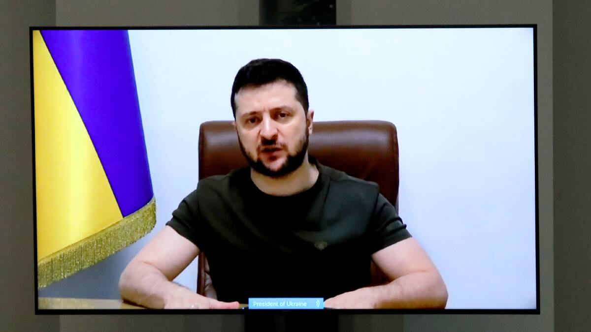President Volodymyr Zelenskyy addresses Parliament via video link from Ukraine earlier this year. Picture: James Croucher