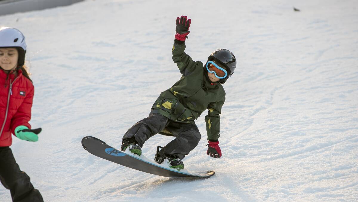 Murillo Suehara 7, enjoys a day of snowboarding at Corin Forest on Sunday. Picture: Keegan Carroll