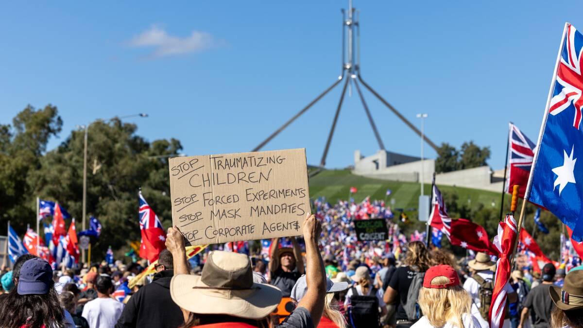 Thousands of people marched to Parliament House earlier this year as part of the Convoy to Canberra protest. Picture by Sitthixay Ditthavong