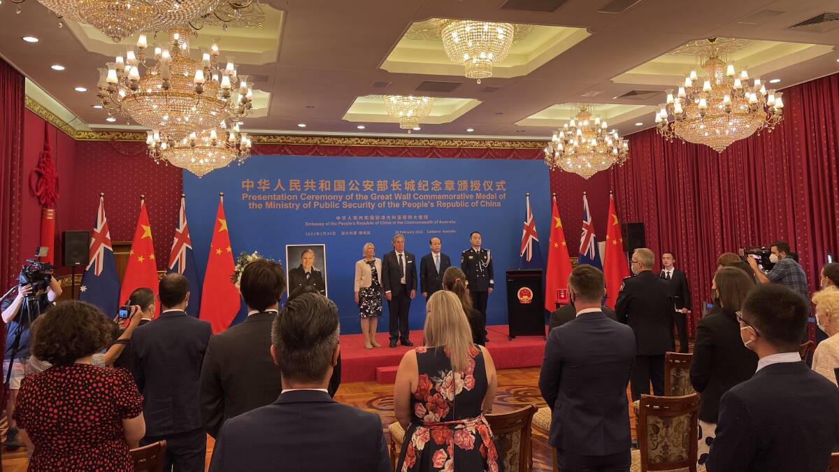 Senior Constable Kelly Foster's parents receive a commemorative medal from the Chinese ambassador to Australia. Picture: Supplied