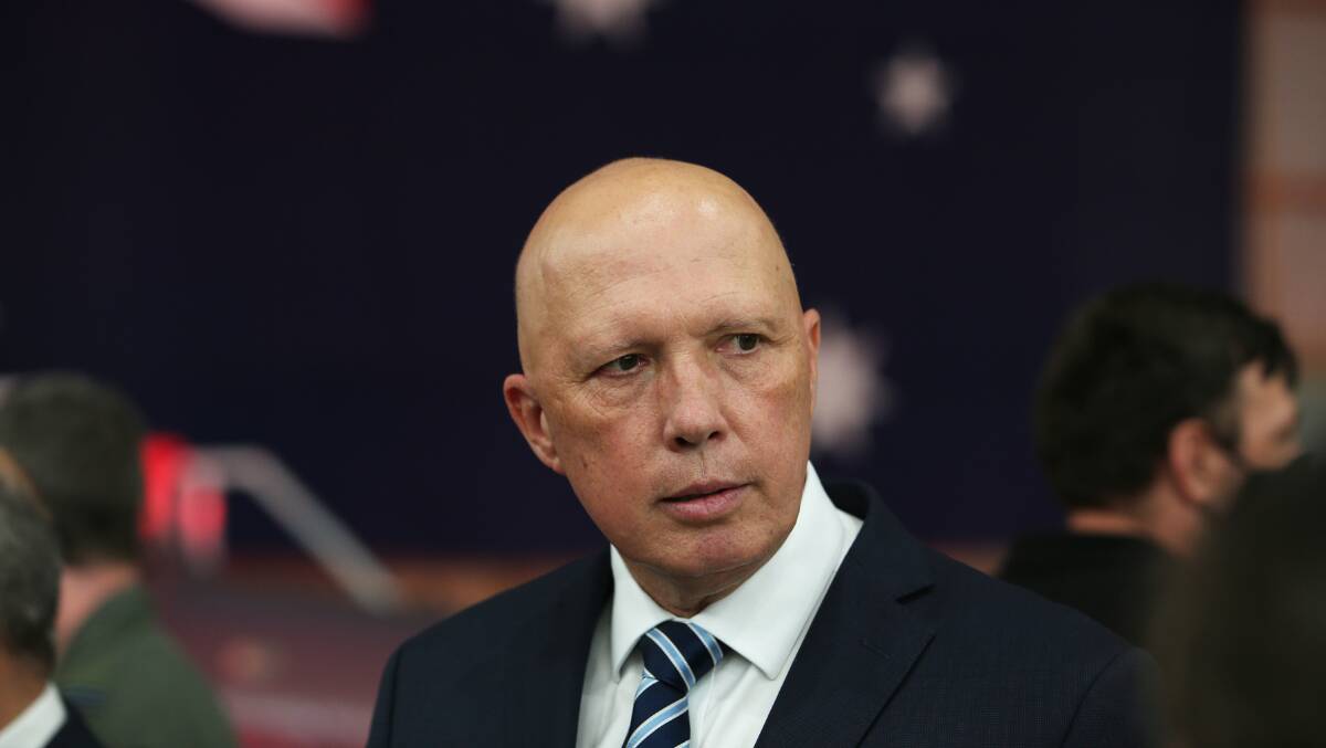Minister for Defence Peter Dutton at RAAF Williamtown Base in February. Picture: Peter Lorimer