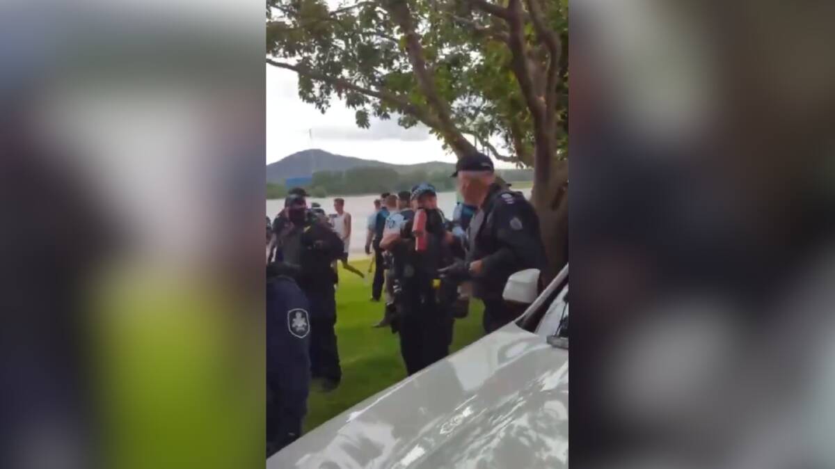 Footage of police officers appearing to celebrate after deploying capsicum spray on anti-vaccine mandate protesters in Canberra. Picture: Facebook