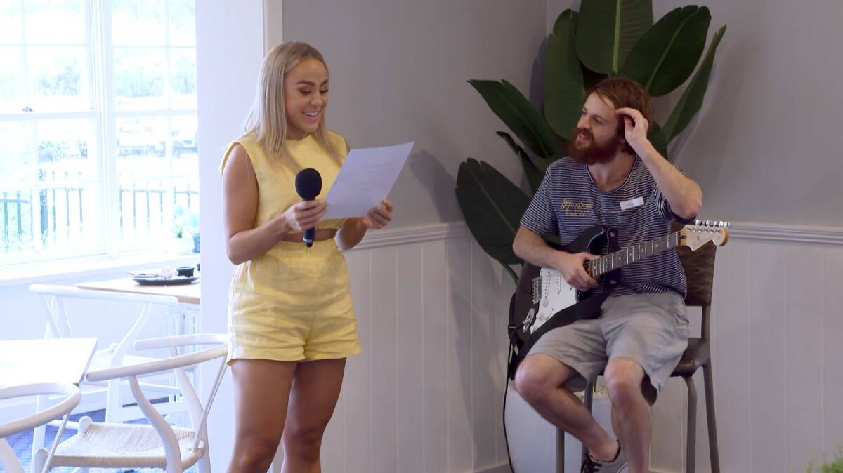 Emily performed Jason's song with him in the North Nowra Tavern. Picture: Channel Nine 