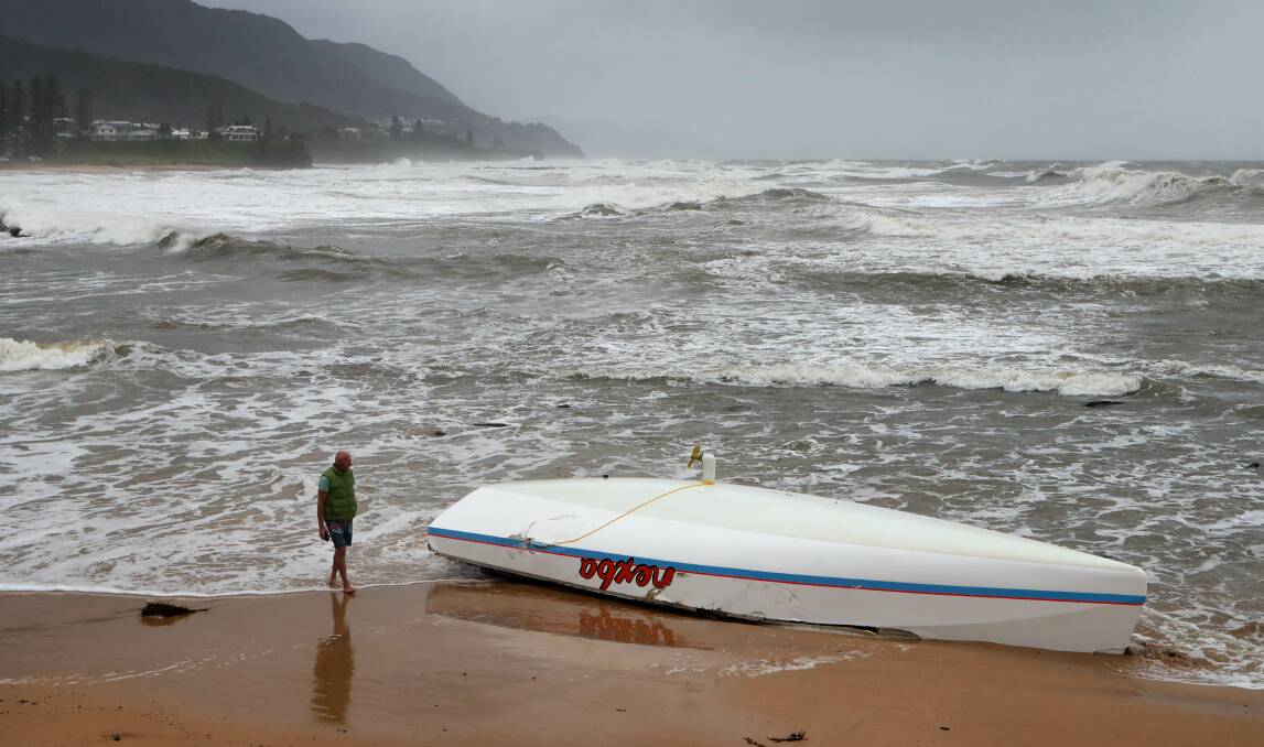 Capsized: Austinmer resident Martin Parmenter (pictured) saw the yacht when out for a walk with his neighbour on Sunday. Picture: Sylvia Liber.