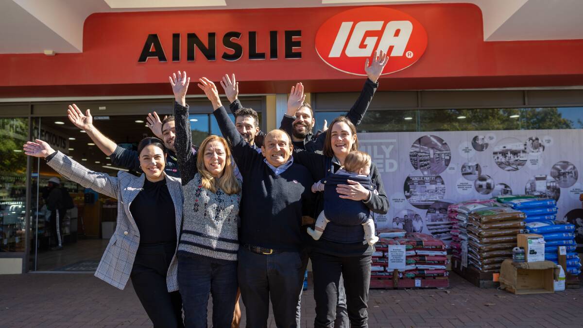 Ainslie IGA owner Manuel Xyrakis with his sister Irene Mihailakis and other Ainslie IGA family members. Picture by Gary Ramage
