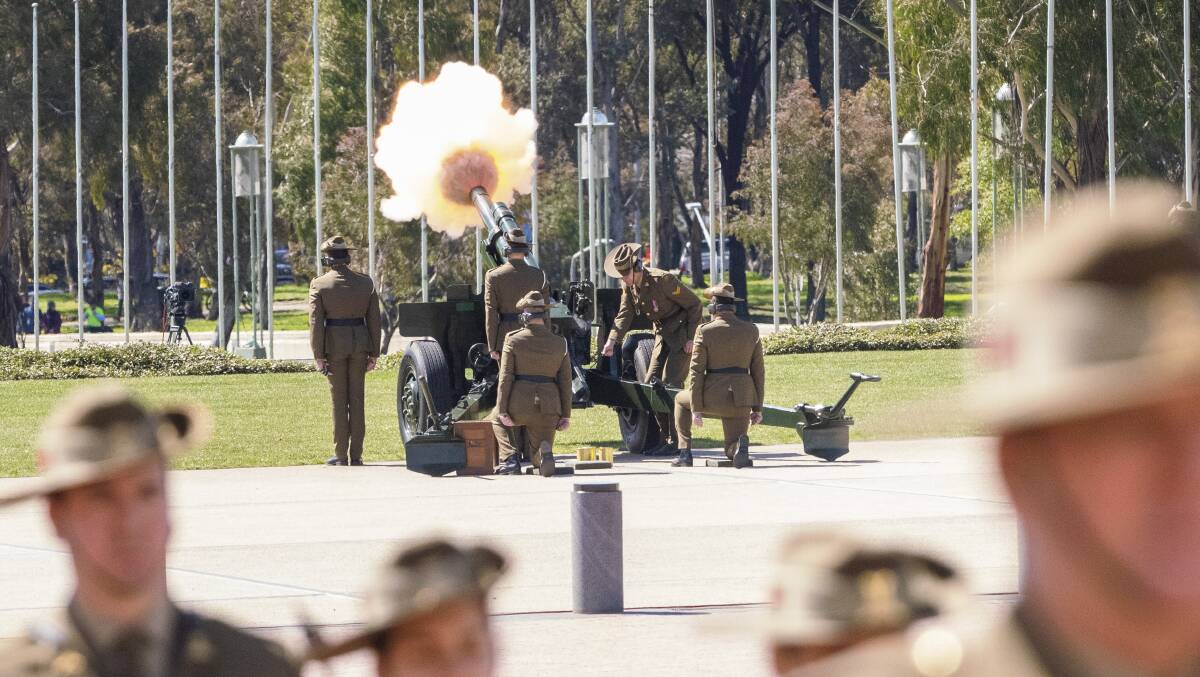 A 21-gun salute during the proclamation ceremony at Parliament House. Picture by Keegan Carroll