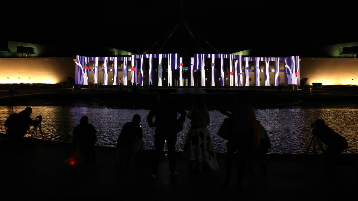 Parliament House is lit up during the capital's Enlighten Festival this week. Picture by James Croucher