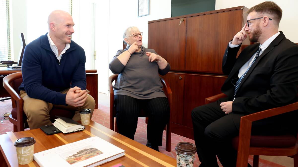 Senator David Pocock in his office at Parliament House with Auslan translator Mandy Dolejsi and DeafACT's Jacob Clarke. Picture: James Croucher