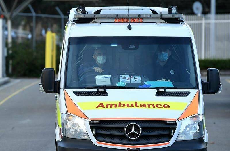Ambulance are on scene at a two-car crash on the Barton Highway in Murrumbateman.