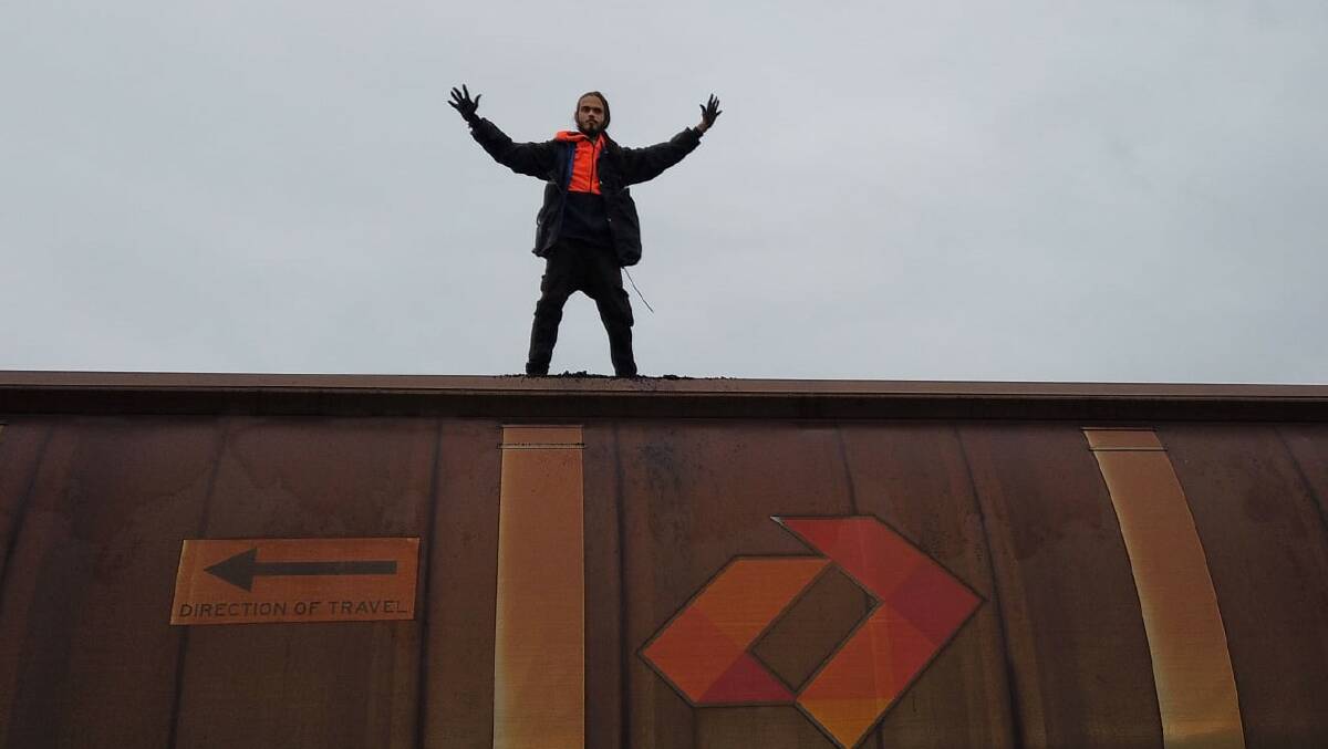 Eric Serge Herbert, 22, during his coal-train protest earlier in November. Picture: Blockade Australia