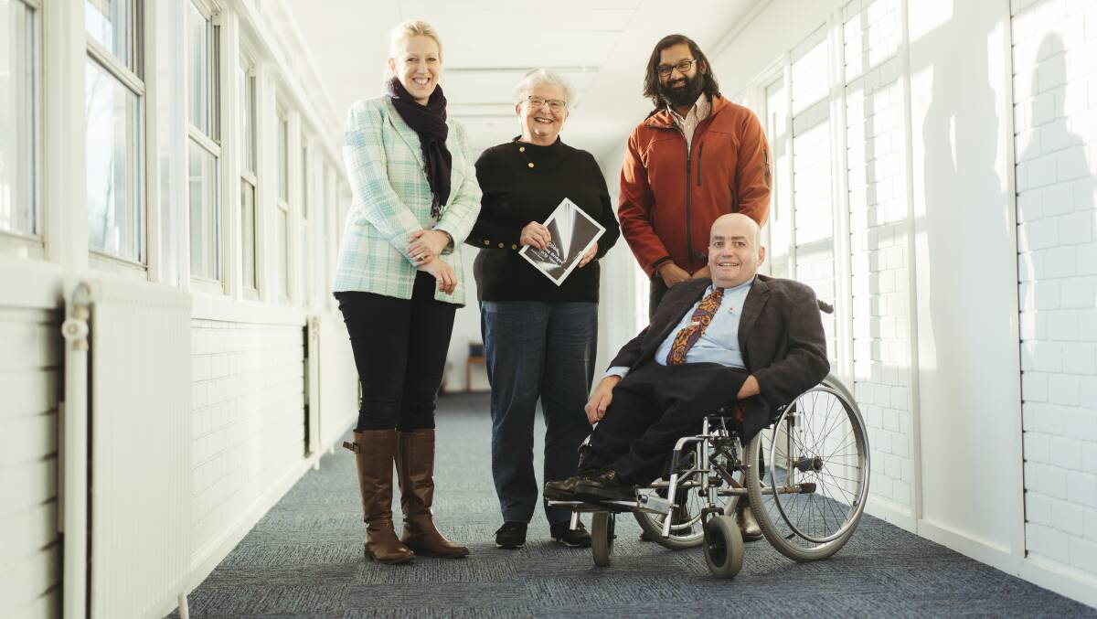 Dr Louise Moran, centre, with ACTCOSS CEO Dr Emma Campbell, capability lead Ryan Joseph and head of policy Craig Wallace honour Ethel McGuire who was named one of six ACT Honour Walk recipients. Picture: Dion Georgopoulos