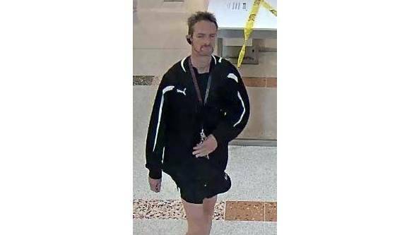 Deane Roach in a CCTV image from the Greenway Coles. Picture ACT Policing