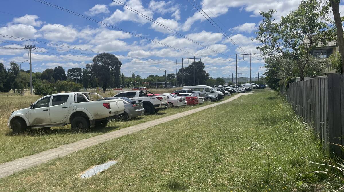 Vehicles parked on the wetland area adjacent to Stirling Avenue in Watson on Saturday during Summernats. Picture supplied
