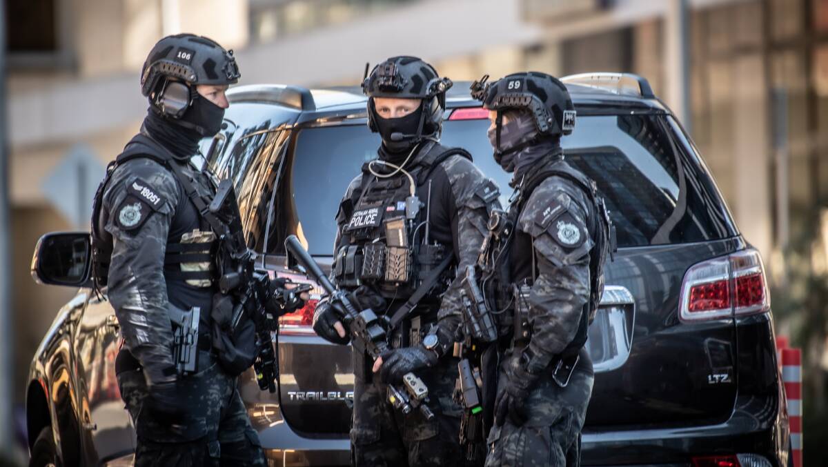 Heavily armed tactical police at the scene in August 2021. Picture: Karleen Minney
