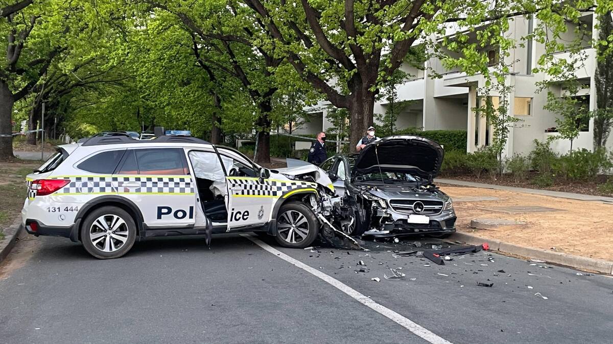 The crash between a police car and the stolen Mercedes sedan driven by the teenage driver last October. Picture: Alex Crowe