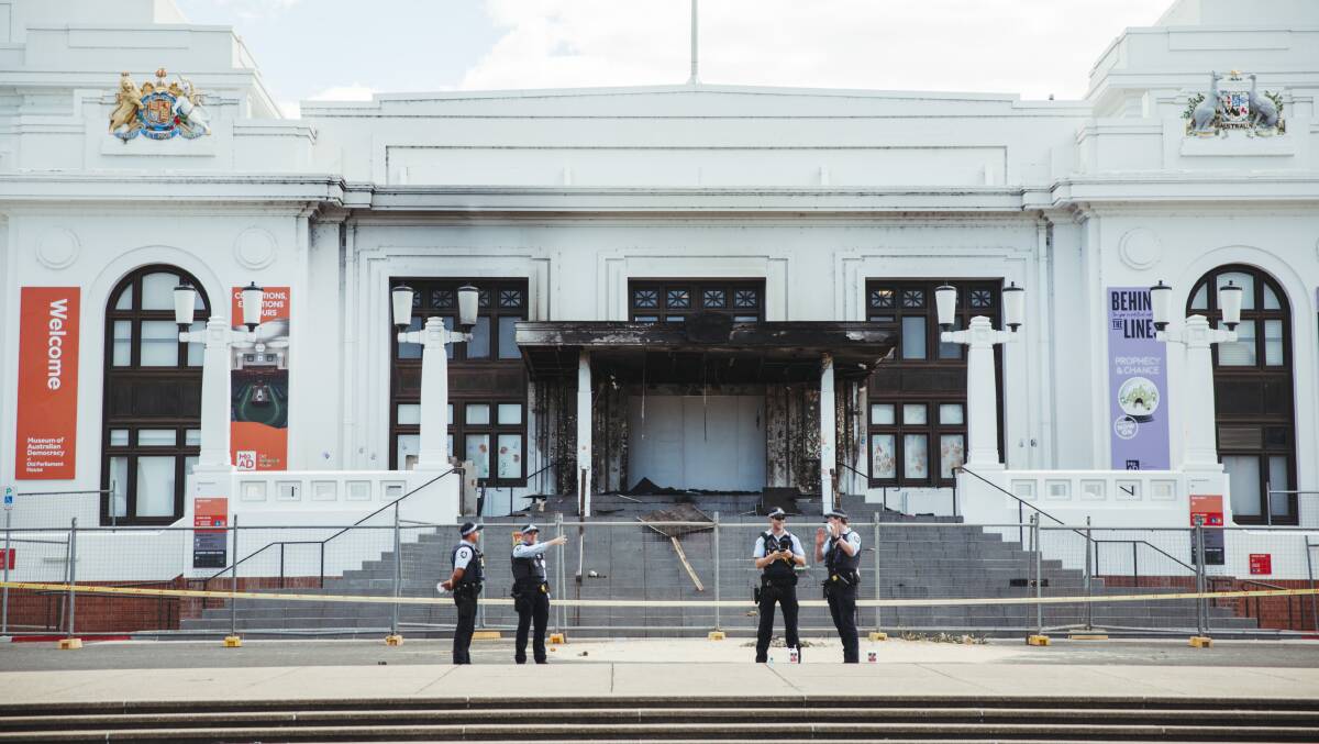Police watch over Old Parliament House following the damaging fire. Picture: Dion Georgopoulos