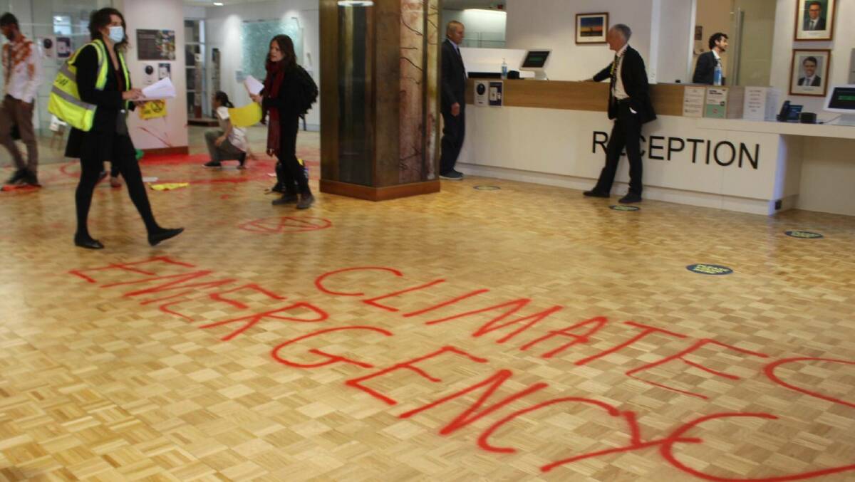 Six climate protesters have admitted to defacing the inside of the John Gorton Building in which the Department of Agriculture, Water and Environment is based. Picture: Extinction Rebellion