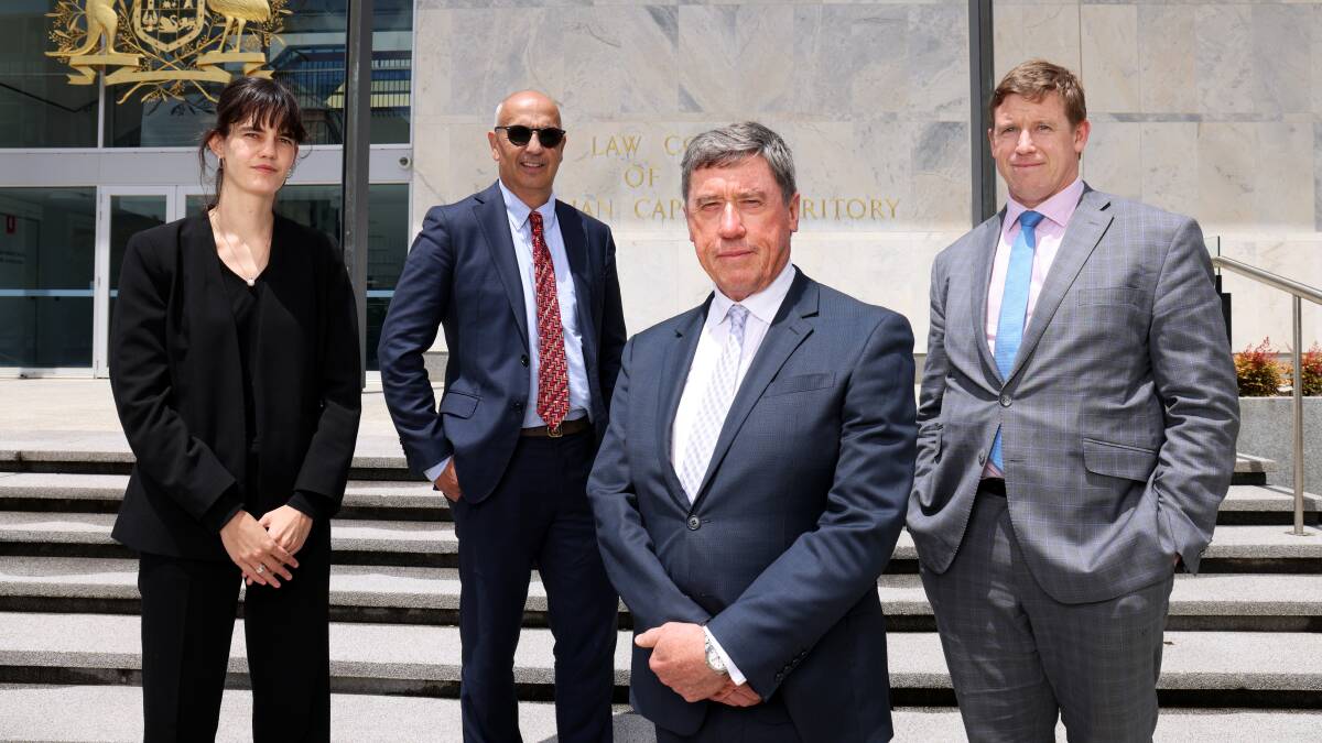 The Ken Cush and Associates lawyers representing the nine NSW and two ACT residents taking part in the Orroral Valley fire inquiry in the ACT Coroner's Court that began on Monday. Left to right; Arabella Jorgensen-Hull, Mark Barrow, Peter Tierney, and Sam Tierney. Picture by James Croucher