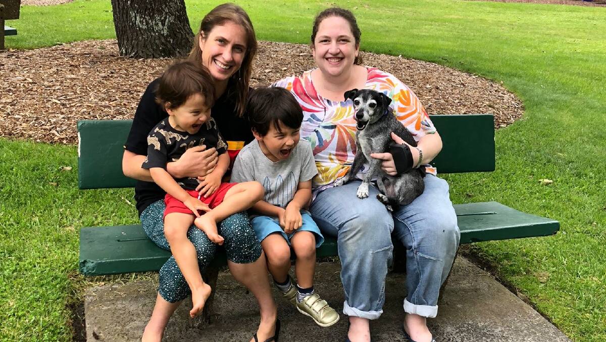 Samson the dog reunited with his family in Mittagong. Leanne Green, Remy, 2, Ari, 5, and Ilana Green. Picture: Supplied