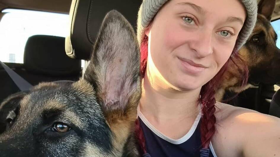 Kira Lee Meagher with a German shepherd. Picture: Facebook