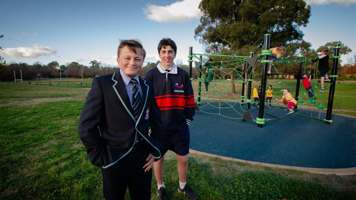 Past students Dylan Pitt 16 and Jaiden Smith 16 at the opening of new "Voyager Park precinct" at Red Hill Primary school . Picture: Elesa Kurtz