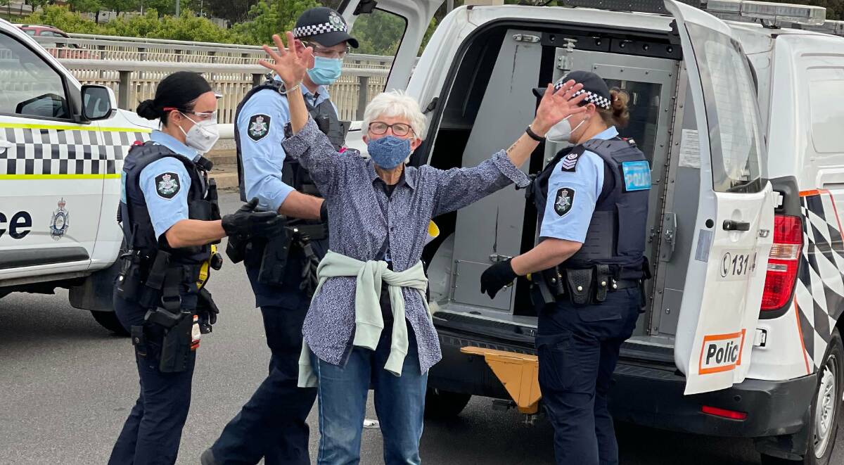 Margaret Clough, 80, on Commonwealth Avenue bridge after protesting. Picture: Supplied
