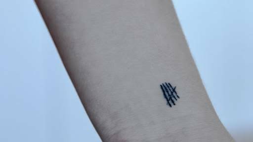 The 5 Seconds of Summer tally mark logo; 'Strength' in Michael Clifford's handwriting; the Demi Lovato heart symbol. Photos: Lanie Tindale