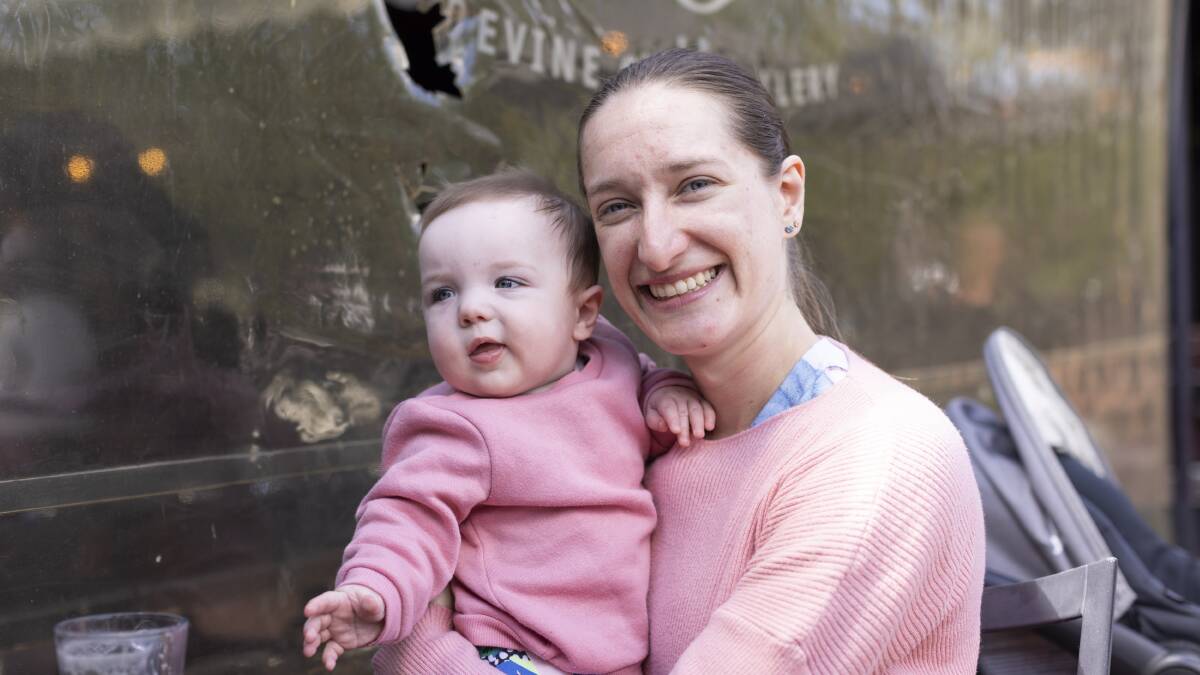 Artist Josie Cosgrove, pictured with baby Desirée, lost her job because of COVID-19. Picture: Keegan Carroll