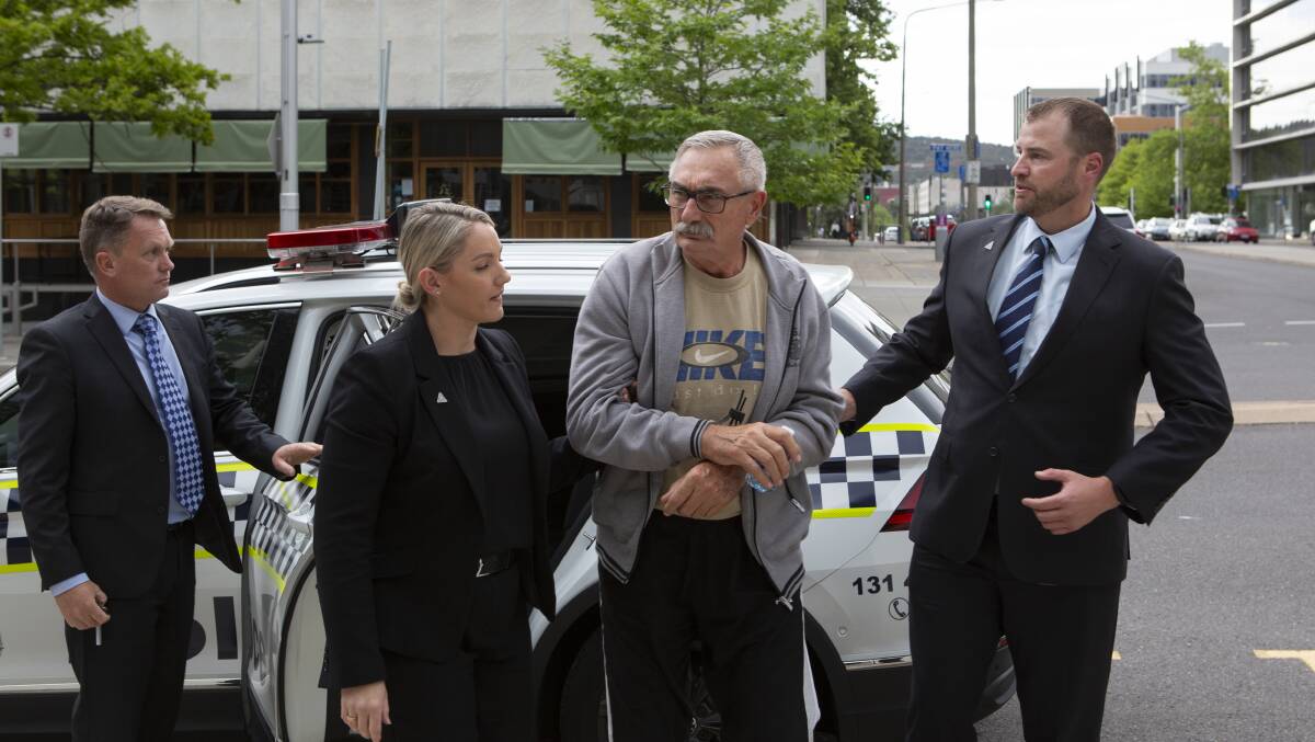 Joseph Vekony, 68, being arrested for the alleged murder of Irma Palasics. Picture by ACT Policing