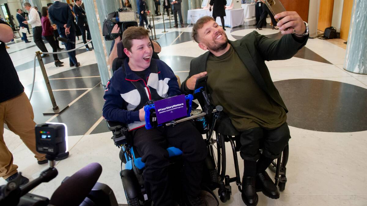 Bas Tech, 13, with Dylan Alcott at Parliament House during Jobs and Skills Summit. Picture by Elesa Kurtz